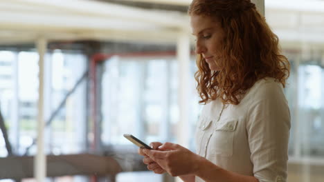 Businesswoman-using-mobile-phone-4k