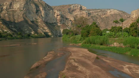 Flight-over-the-Catumbela-River,-Benguela,-Angola-Footage-with-Drone,-120-fps