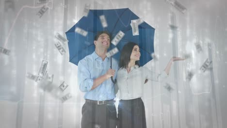 couple holding an umbrella with money bills falling