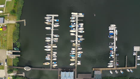 top aerial view of yachts moored in the marina