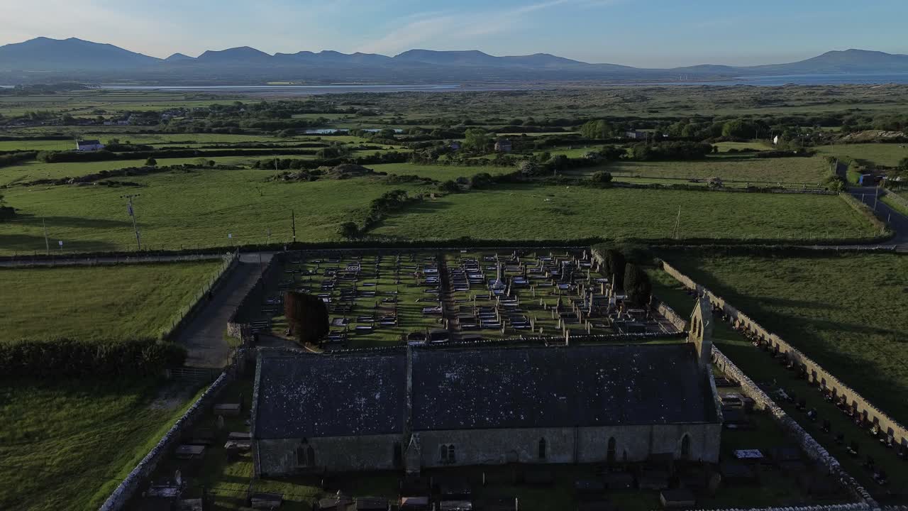 St Peters church aerial view Welsh early morning sunrise Snowdonia countryside farmland