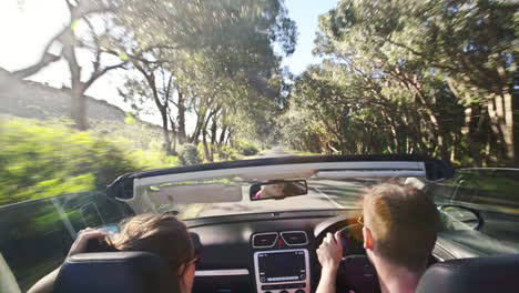 couple driving convertible car cabriolet cape town south africa steadicam shot