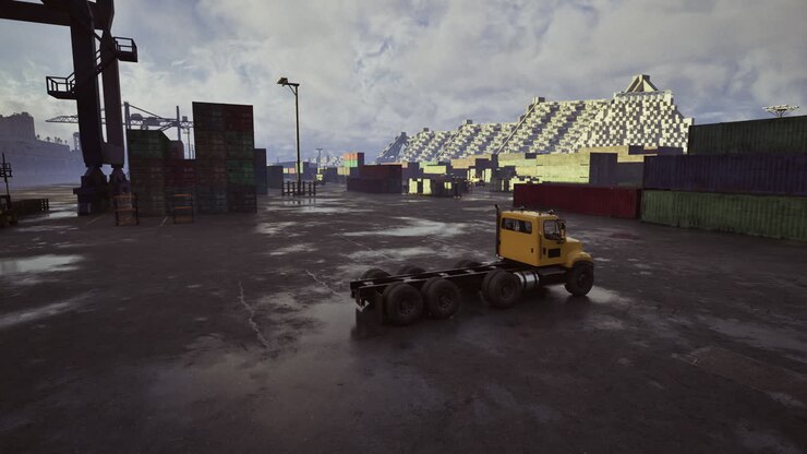 Truck moving through a busy cargo yard during overcast weather