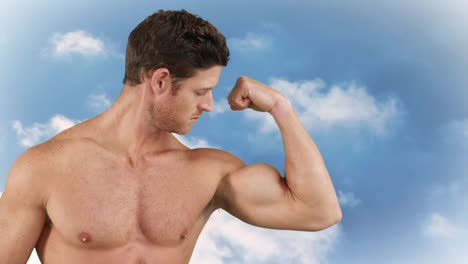 man flexing his biceps on a sky background