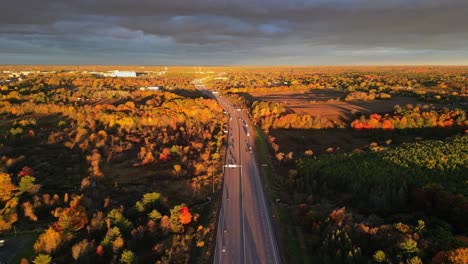 highway aerial during fall sunrise