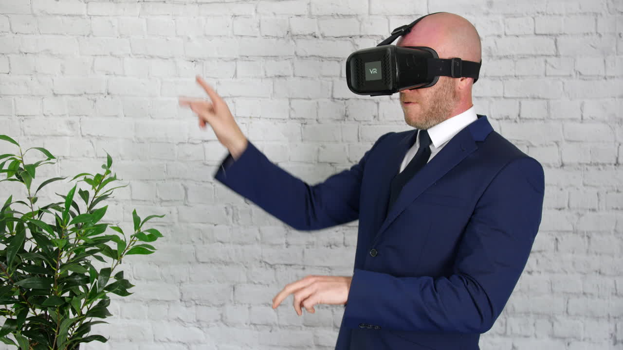 A businessman in a suit is using a VR headset for augmented reality in the virtual metaverse
