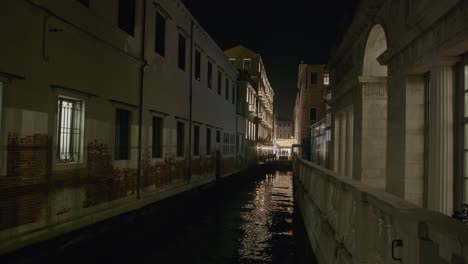 night canal reflections in venice