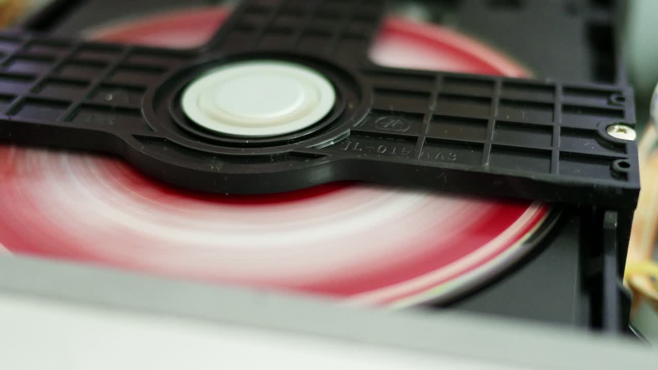 Discover the nostalgia of a spinning vinyl record in a cozy home studio setting.