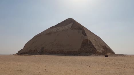 wide angle shot of ancient dahshur bent pyramid in egypt