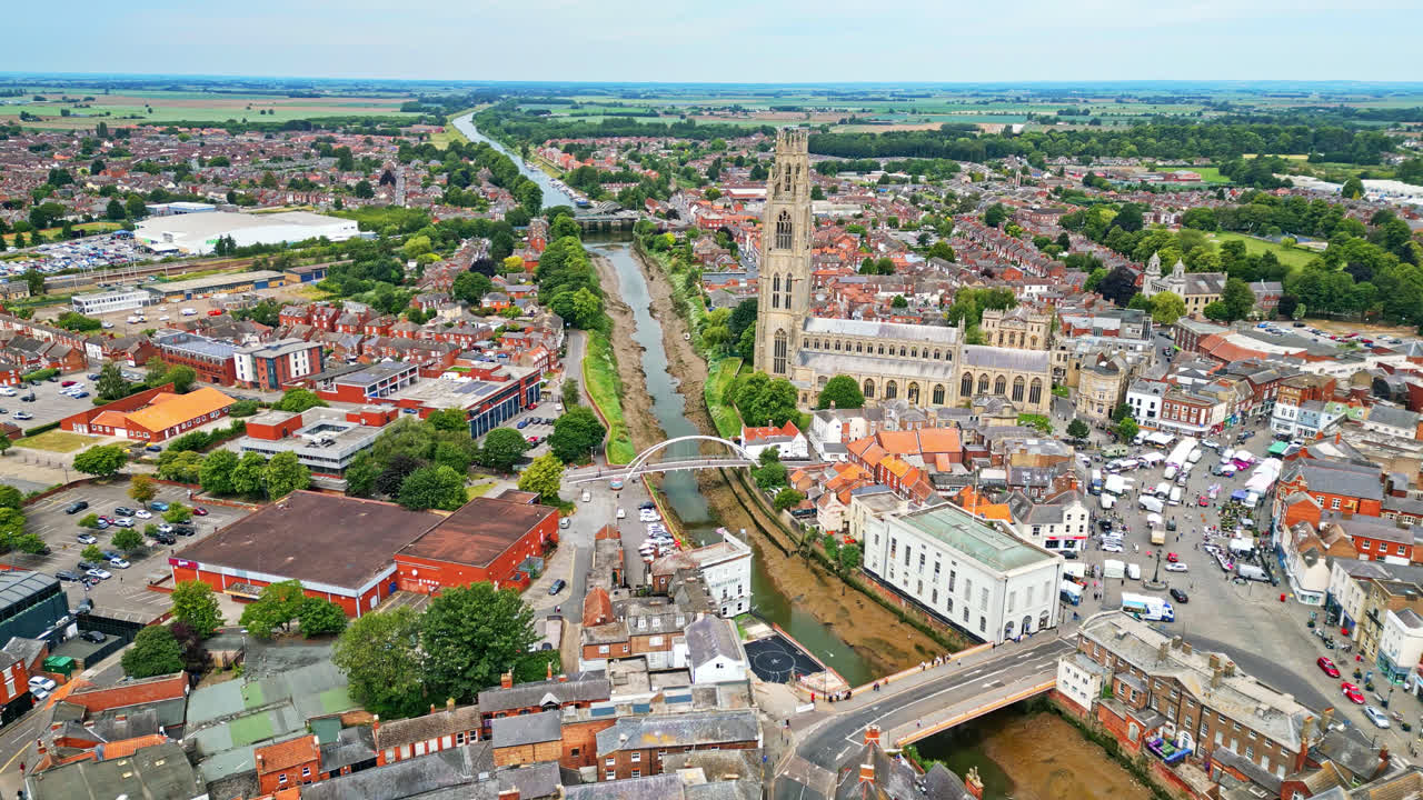 scenic beauty of Boston, Lincolnshire, in mesmerizing aerial drone footage: Port, ships, Saint Botolph Church , Saint Botolph's Bridge