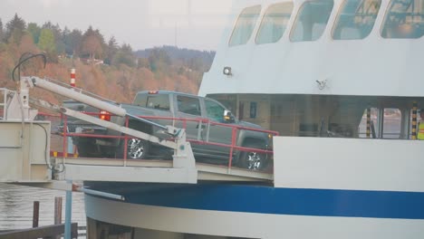 vehicles driving onto a ferry