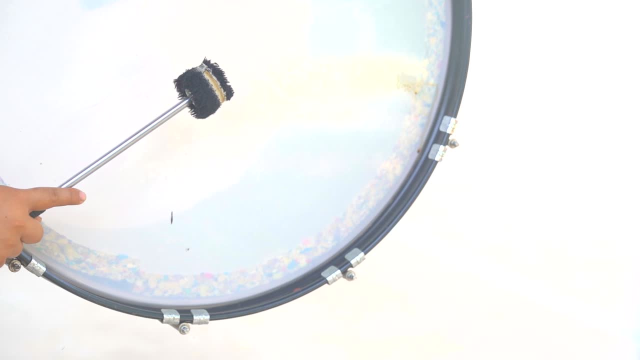 Drummer hitting drum slow motion