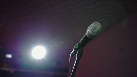 microphone in bright light. an empty hall without spectators. concert hall scene