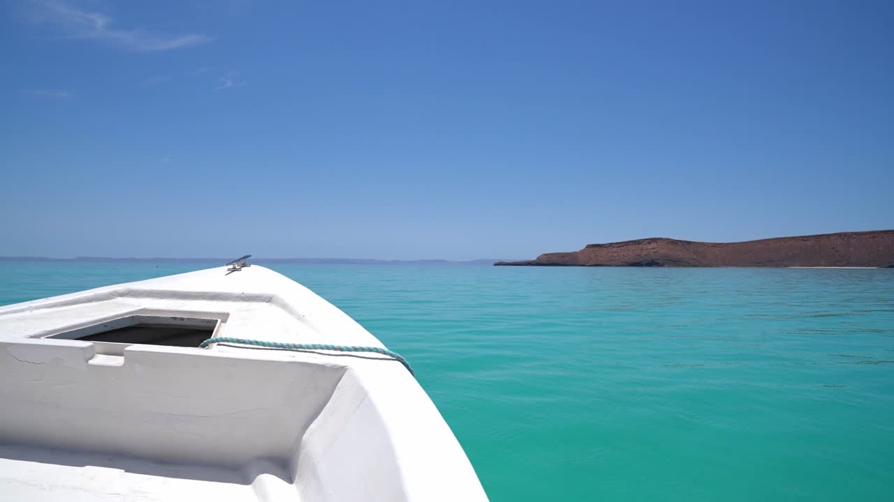 Front of a boat sailing on beautiful blue waters in Isla Espiritu Santo, BCS, Mexico