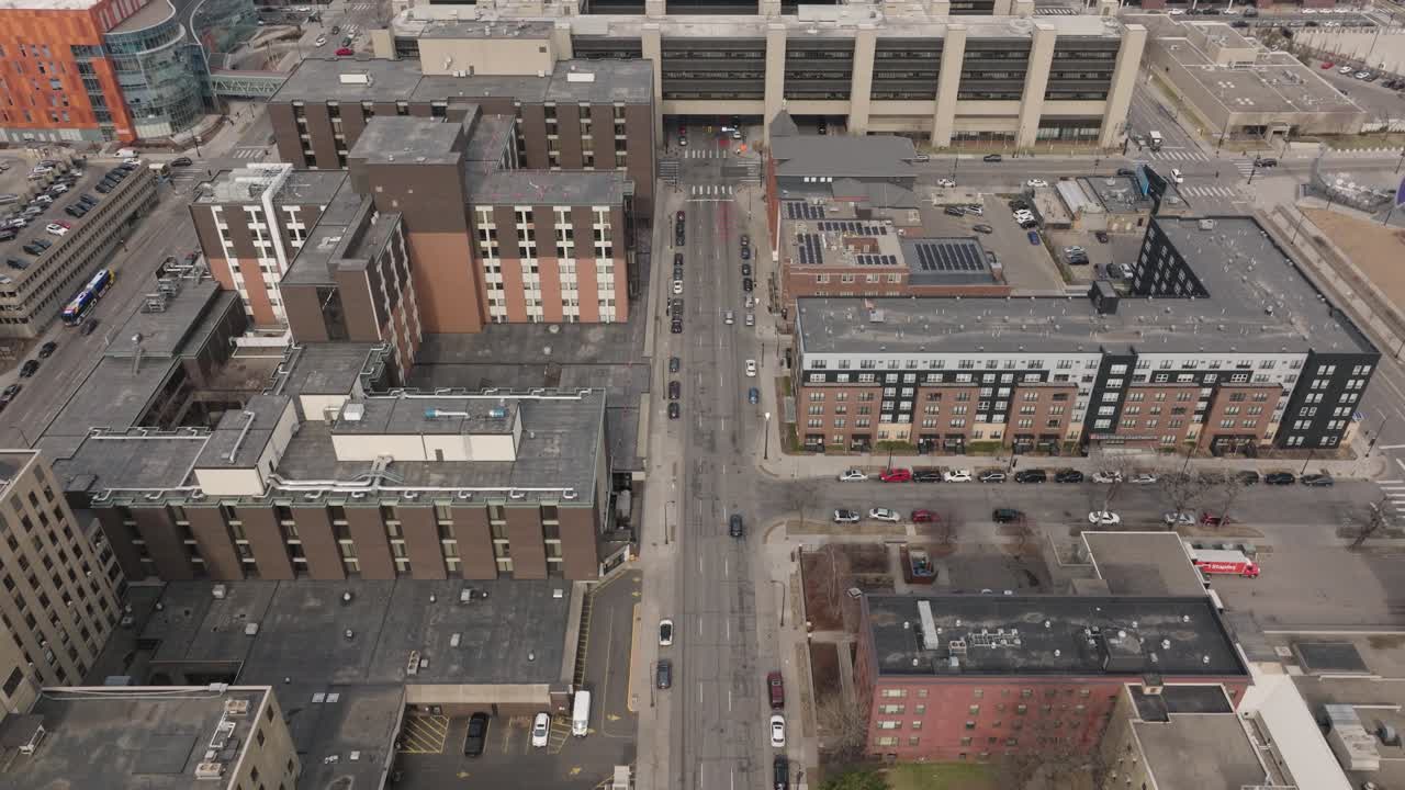 Aerial view of central Minneapolis street lined with tall buildings in downtown.