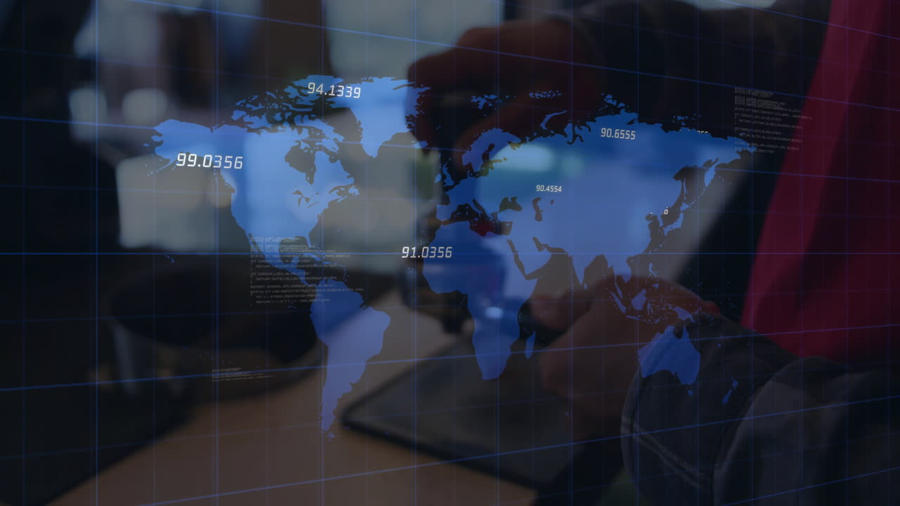 Seated man tapping tablet in tech office featuring digital world map projecting numeric data points