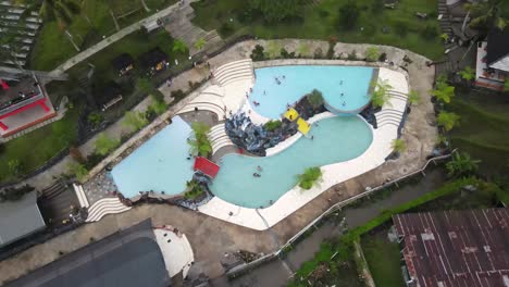 aerial view of banyu langit swimming pool at grabag magelang which has the beautiful natural charm of mount andong