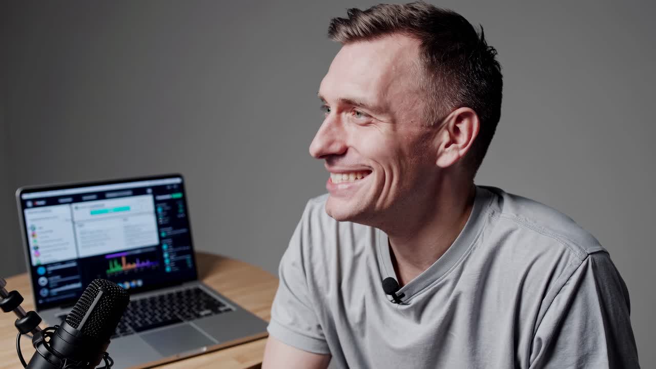 Casual video setup with a man speaking, side angle