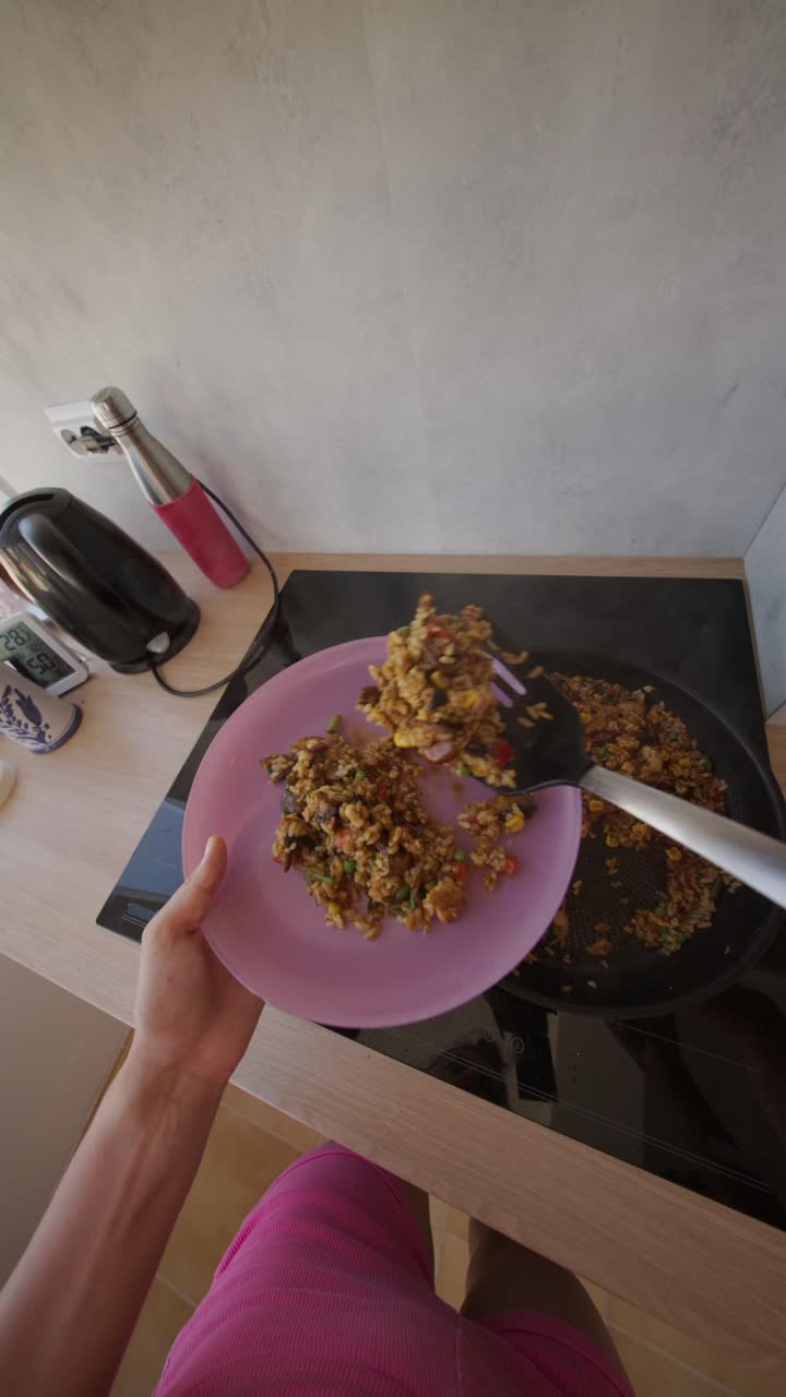Cooking fried rice in the kitchen