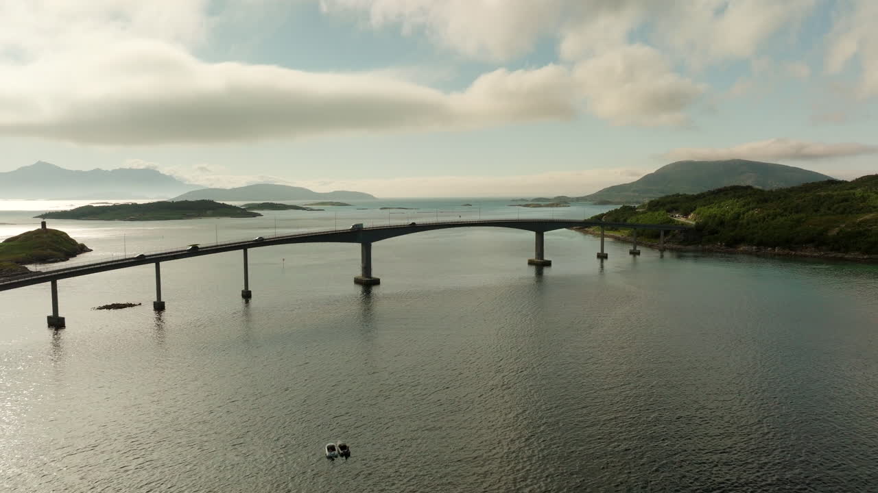 Sommarøy Bridge connecting islands in Norwegian archipelago, Norway. Aerial forward