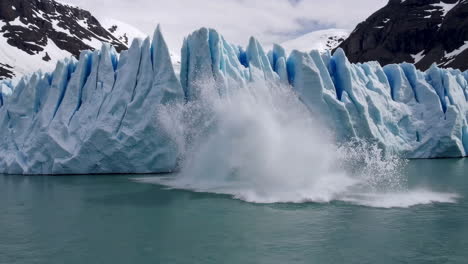 glacier calving into a lake