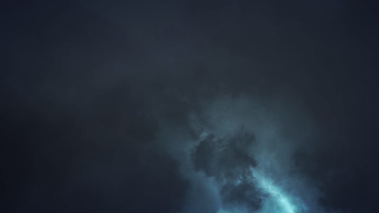 Cloud Lightning - Eerie spectacular and dramatic lightening storm illuminating the inside of dark and sullen clouds with brilliant and intense bolts and flashes of pale blue lightning