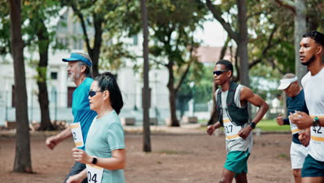 group of people running a race in a city park