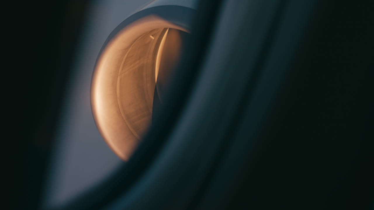Jet engine while aircraft is performing banking turn.