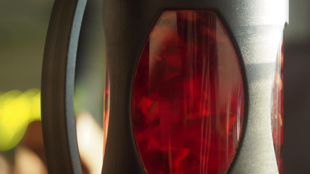 Close-up of red tea in a glass infuser