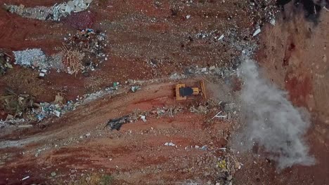 bulldozer operating on landfill