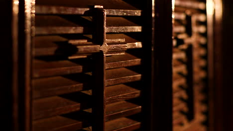 A-small-wooden-cross-hangs-in-the-church---close-up