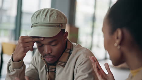 argue, conflict and couple in cafe for talking