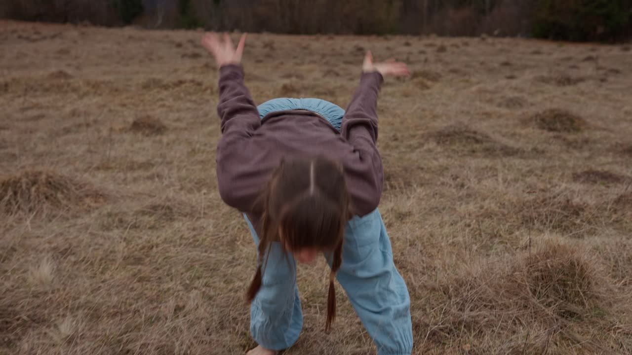 Woman enjoying sunset in the mountains