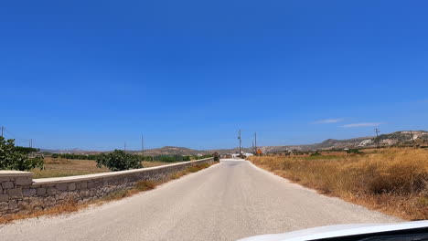 countryside road in greece view in front of