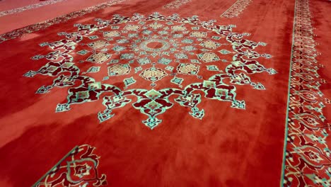 red carpet with intricate islamic pattern