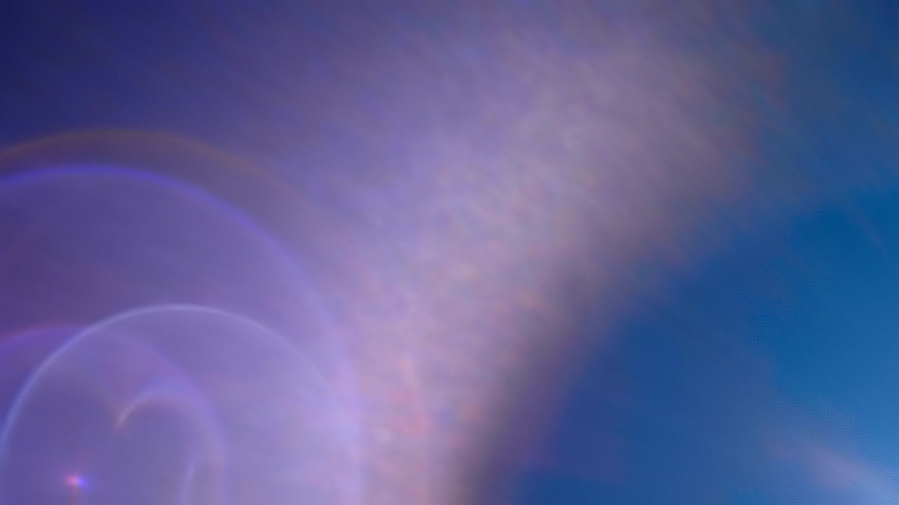 destellos coloridos en la lente de una fuente de luz brillante sobre un fondo negro