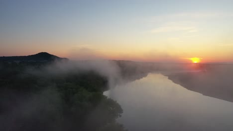 misty sunrise over a river