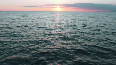 sunset over the calm ocean