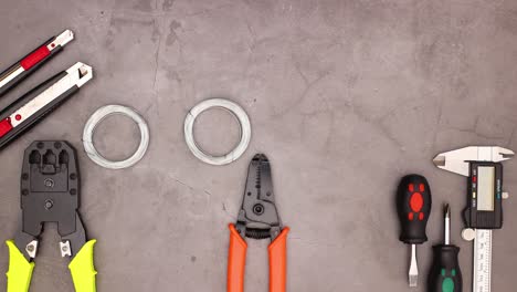 construction tools appear on work table - stop motion do it yourself