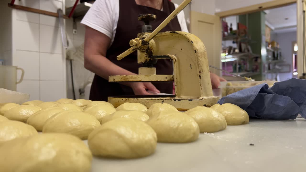 Bakery scene: preparation of traditional  handmade &ldquo;empanadillas&rdquo; .