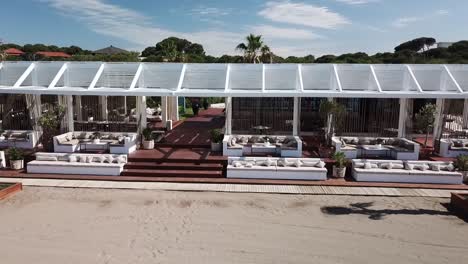 Side-flying-near-luxury-empty-bar-beach-in-Turkey-for-relaxation