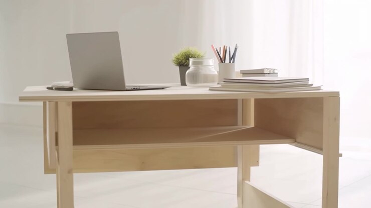 Bright Minimalist Home Office With Laptop, Scandinavian Wooden Desk, Stacked Notebooks, Glass Pencil Holder,