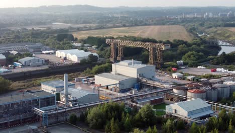 Warrington-historic-transporter-bridge-industrial-British-ship-canal-aerial-view-landscape-pull-away