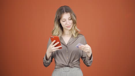 Young-woman-shopping-with-credit-card.