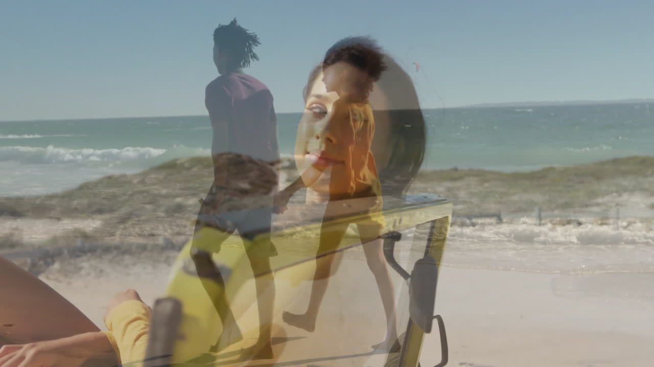 Relaxing in chair, woman watching animation of person walking by ocean scene