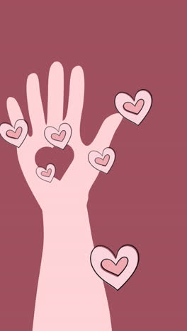 animación de corazones y mano sobre fondo rosado