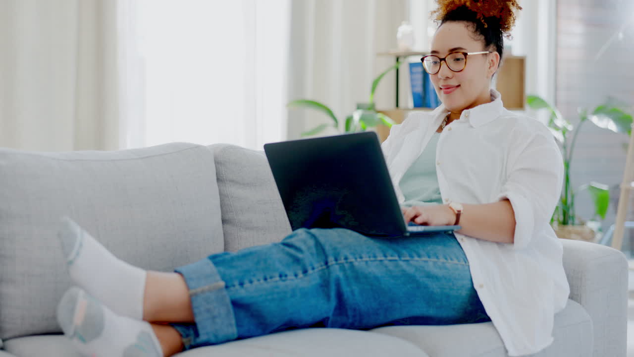 Woman relax on couch with laptop for internet
