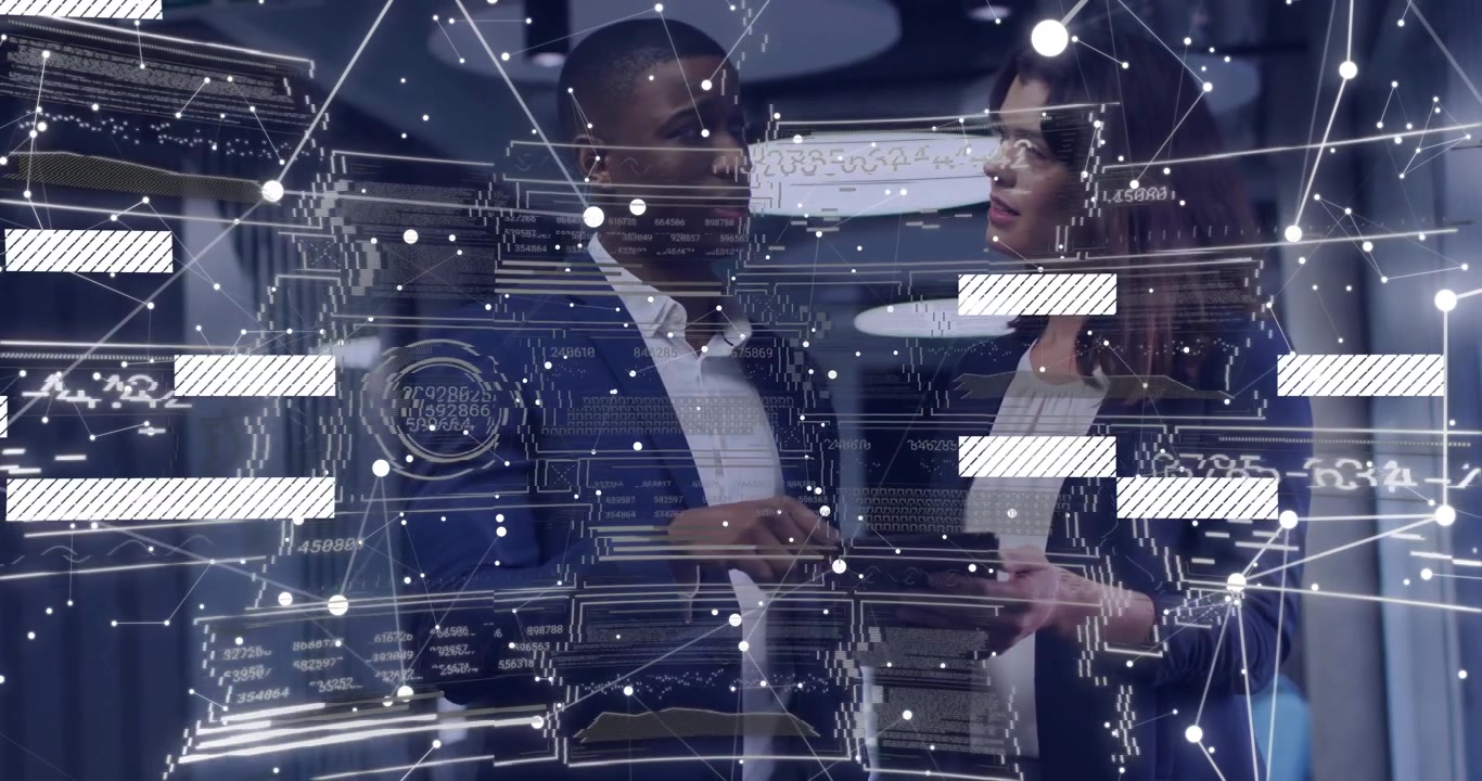 man holding tablet and woman examining charts in office, displaying business data graphics