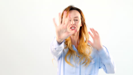 frustrated woman standing against white background 4k