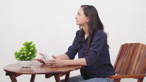 indian girl waiting for someone for a long time